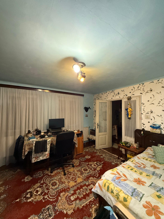 Casa individuala 4 camere, 2 bai, 424 mp teren, centrala proprie, zona Romana