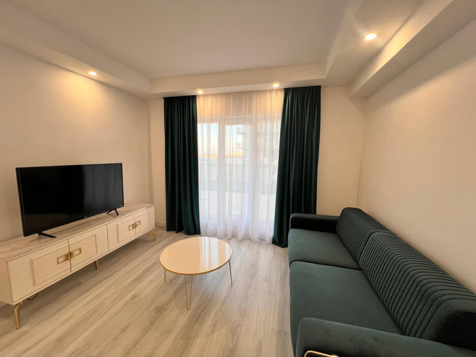 Apartament 2 camere cu gradina+loc de parcare Cosmopolis