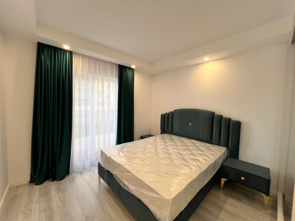 Apartament 2 camere cu gradina+loc de parcare Cosmopolis