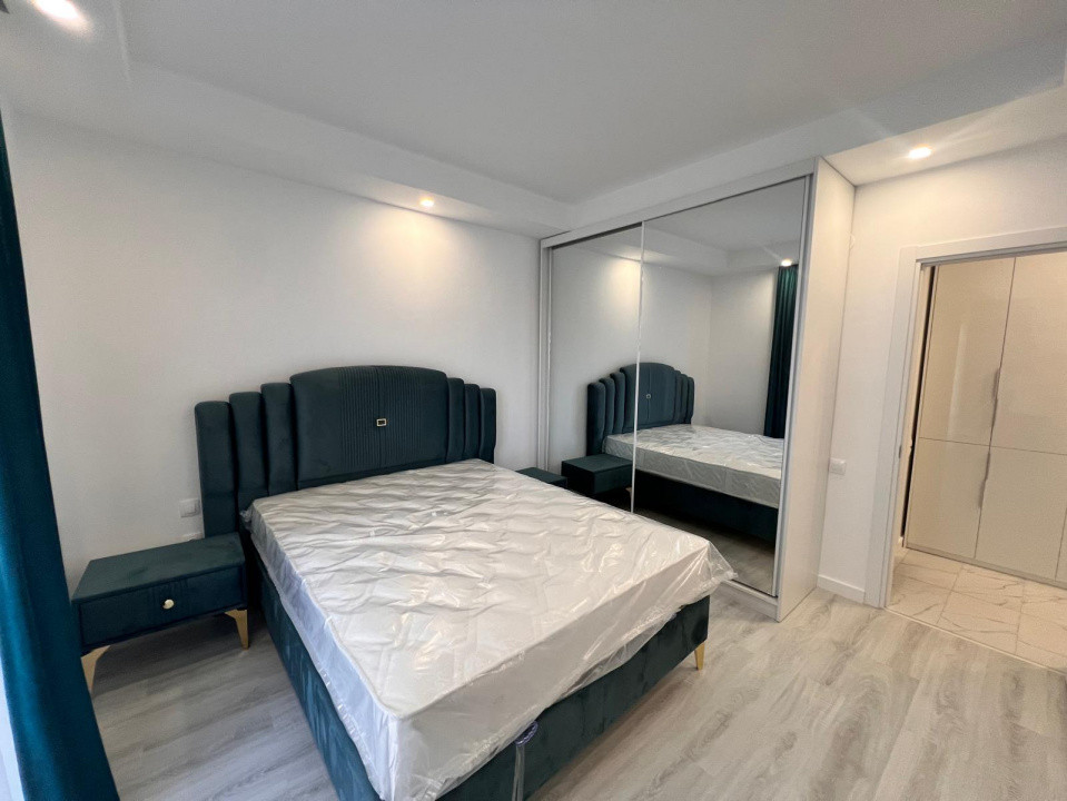 Apartament 2 camere cu gradina+loc de parcare Cosmopolis