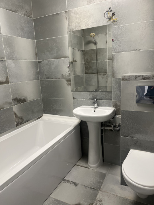 Apartament 2 camere 52 mp, bloc nou, centrala, parcare, zona Trapezului