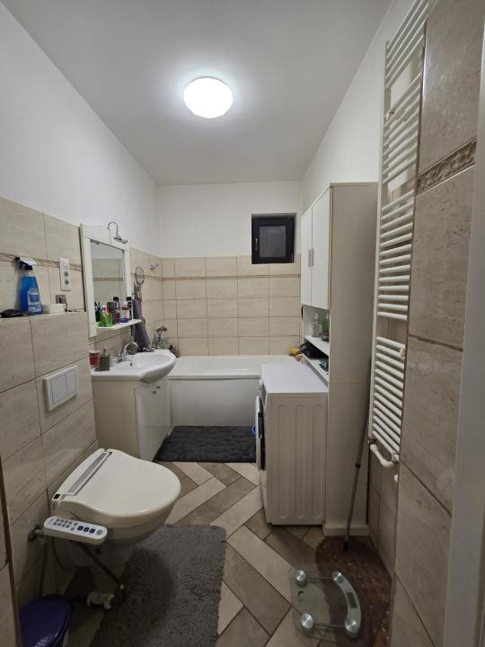 Apartament cu 3 camere si loc de parcare